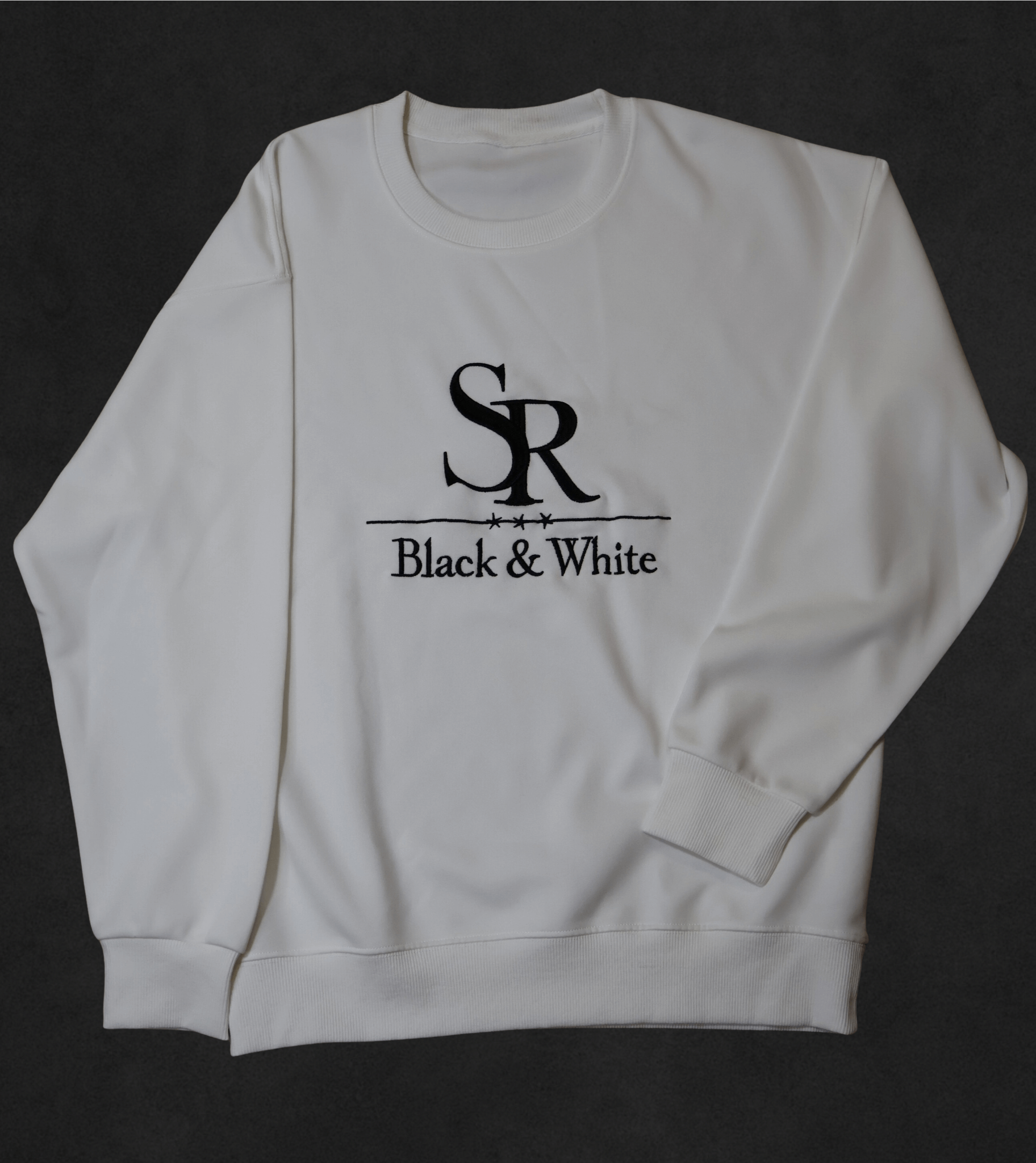 SR Black & White Sweater – Unisex, white cotton blend sweatshirt with embroidered logo, perfect for minimal style and everyday wear.